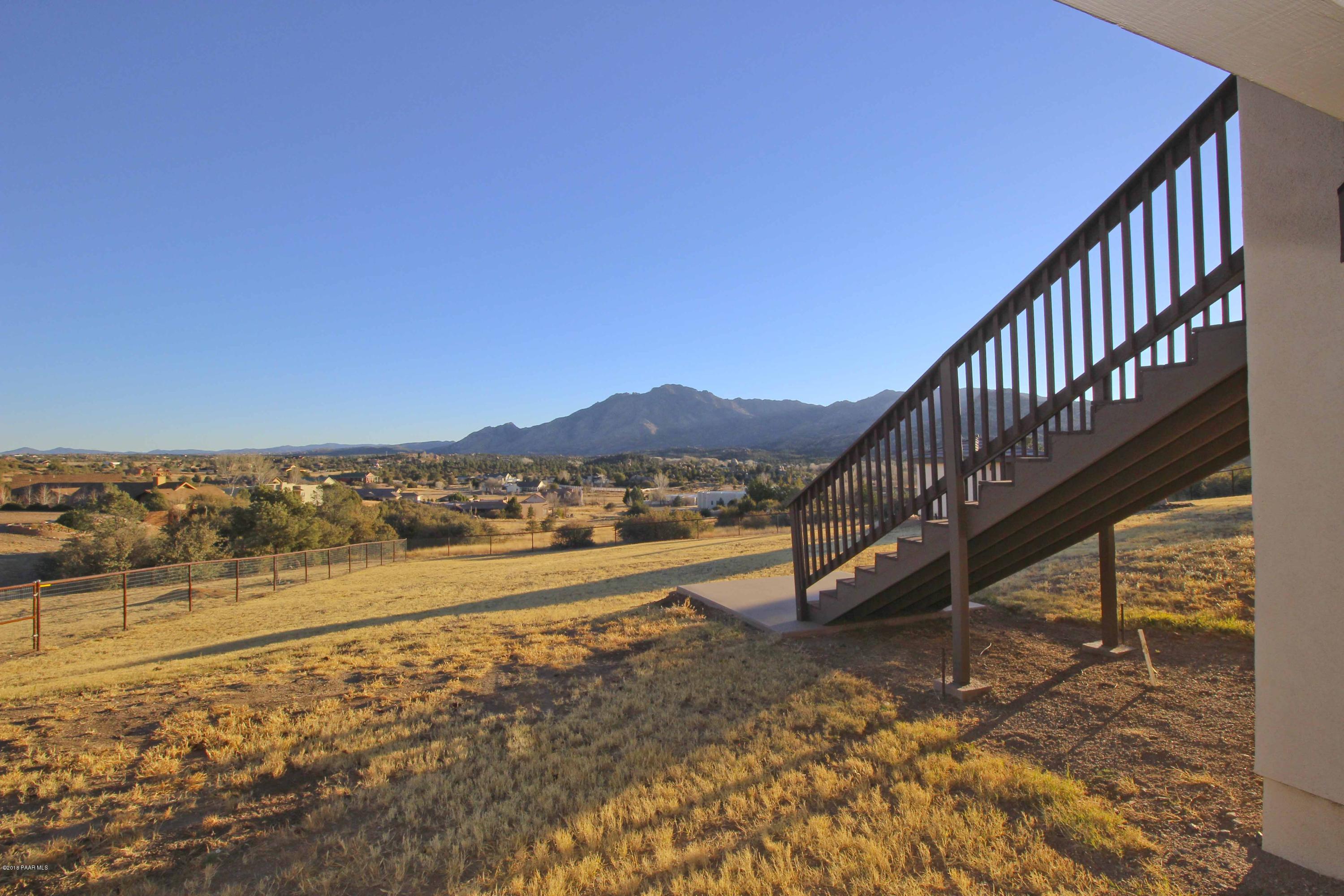 4800 West Mint Creek Road Prescott, AZ 86305 - Photo 28 of 62 a view of a lake with a ocean beach