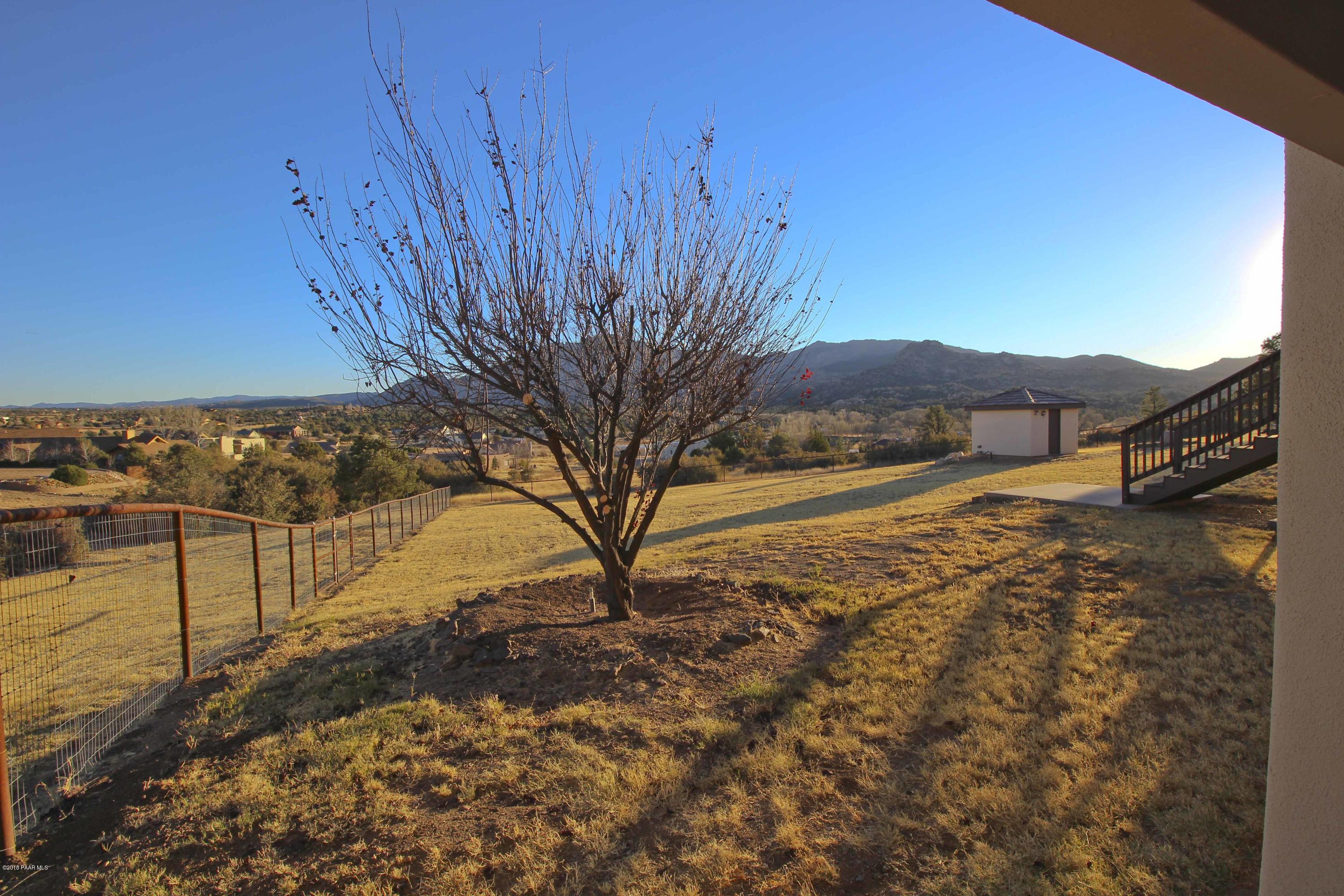 4800 West Mint Creek Road Prescott, AZ 86305 - Photo 29 of 62 a view of a yard with wooden fence