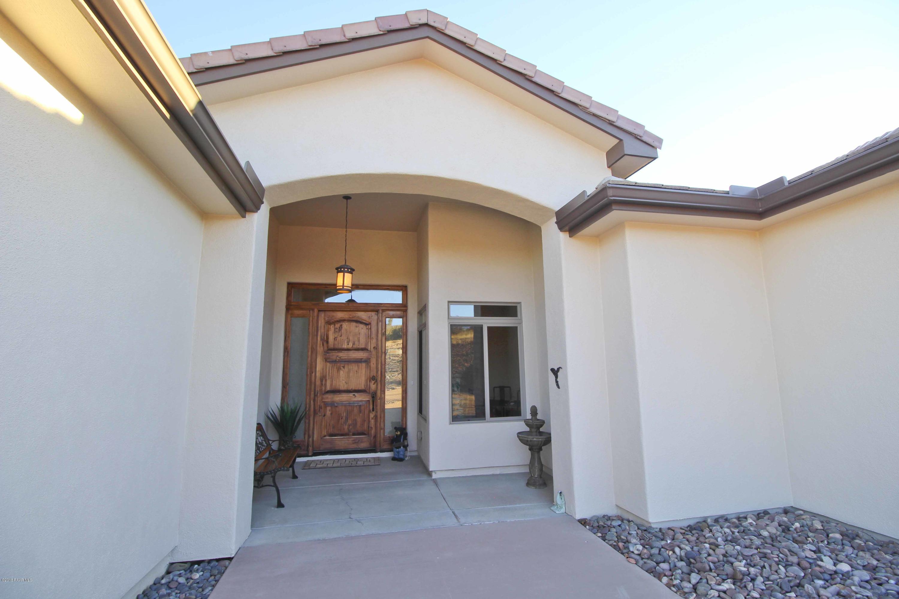 4800 West Mint Creek Road Prescott, AZ 86305 - Photo 5 of 62 a view of a hallway to rooms