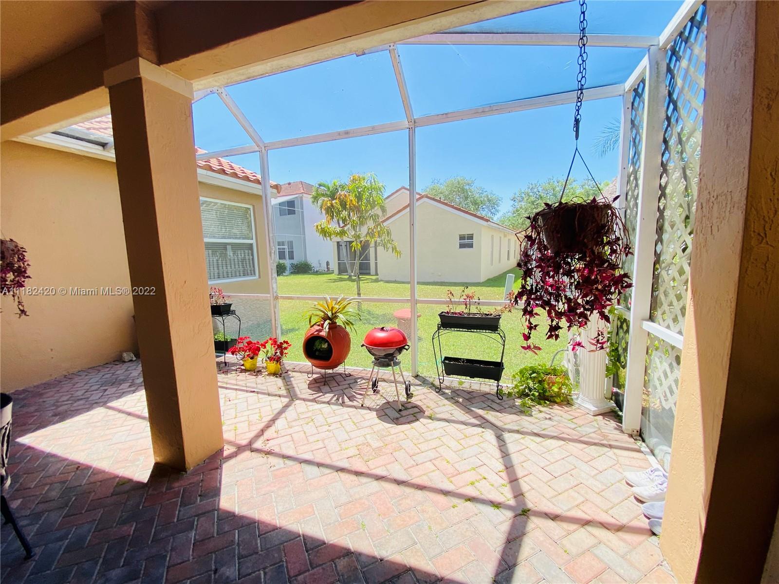 944 Falling Water Road Weston, FL 33326 - Photo 25 of 37 a view of living room