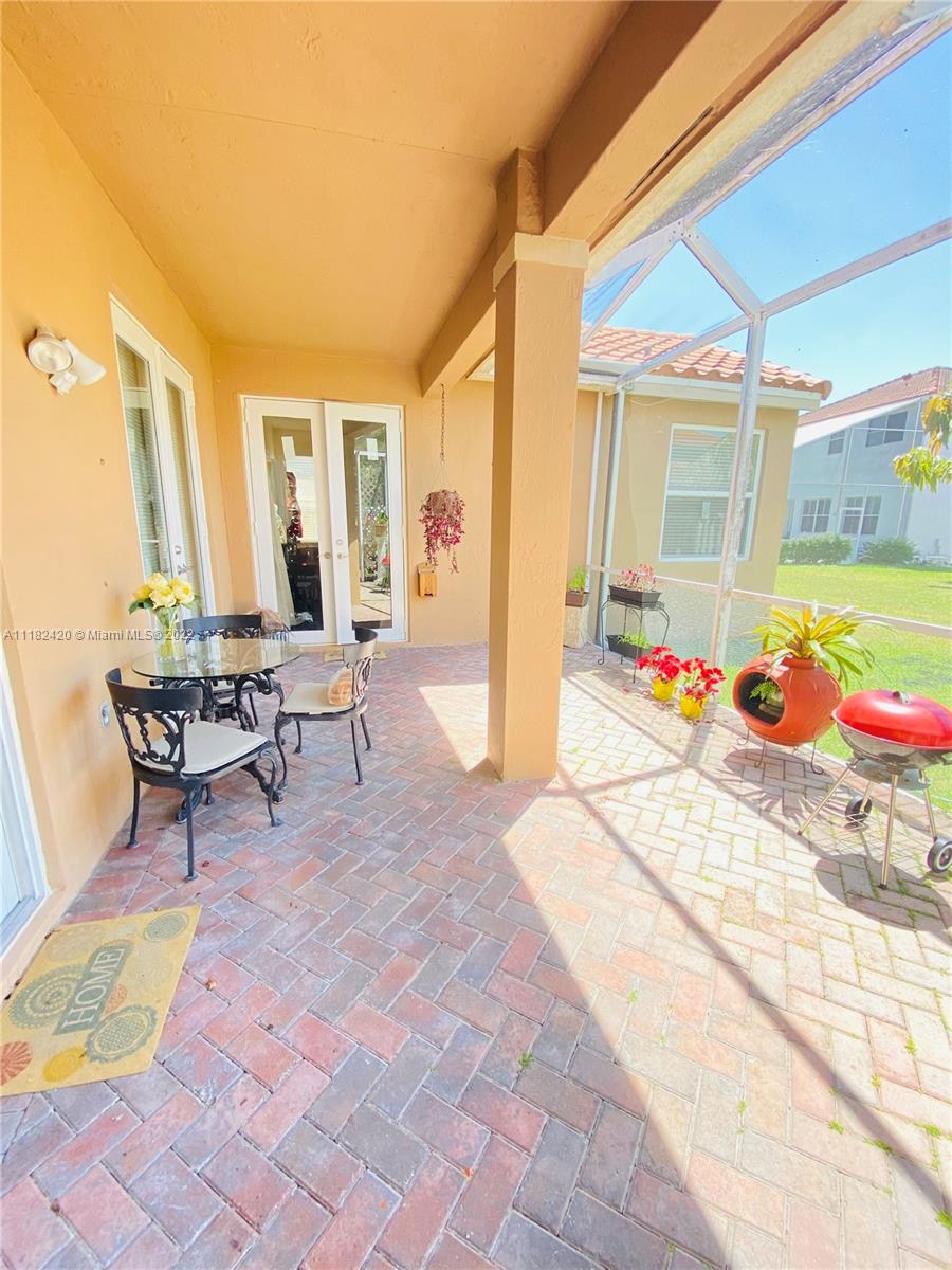 944 Falling Water Road Weston, FL 33326 - Photo 26 of 37 a outdoor space with furniture