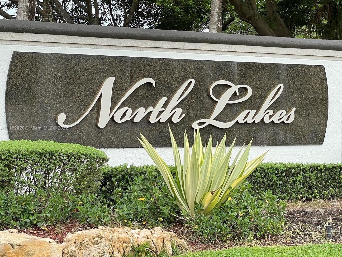 944 Falling Water Road Weston, FL 33326 - Photo 33 of 37 a close up of a street