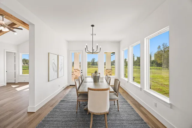 a view of a house with a big yard