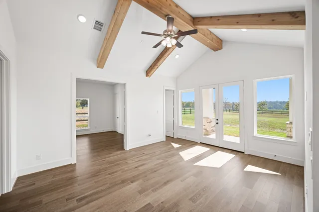 swimming pool view with a lake view