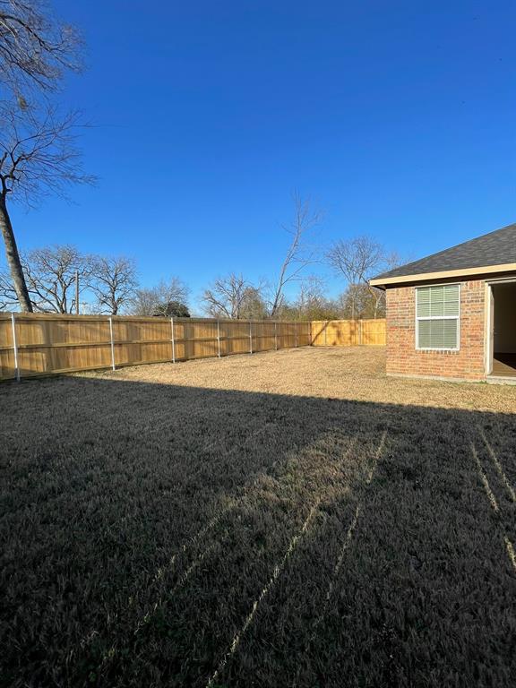 212 Mineral Wells Street Terrell, TX 75160 - Photo 16 of 16 a view of an ocean from a yard