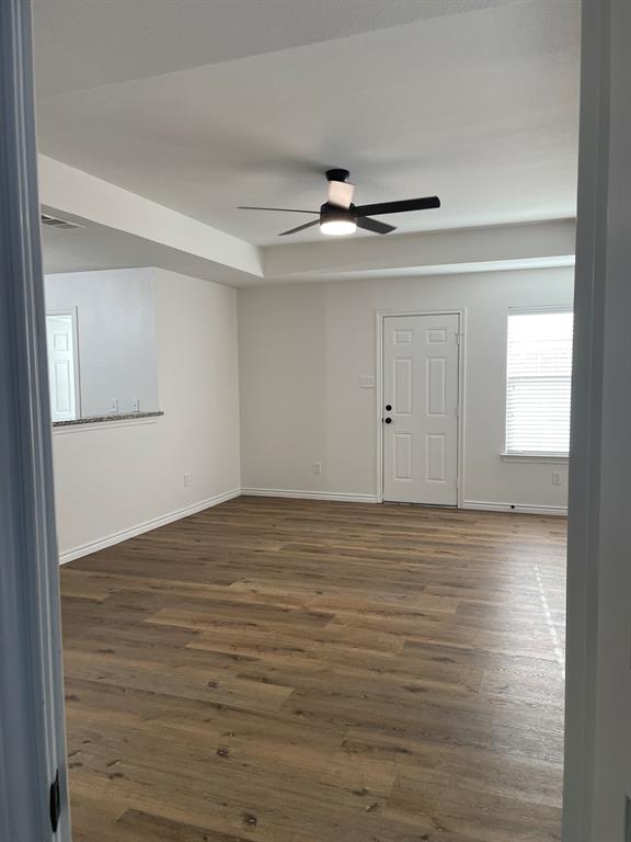 212 Mineral Wells Street Terrell, TX 75160 - Photo 7 of 16 a view of an empty room with a window