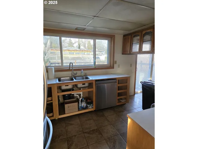 a kitchen with a stove and a microwave