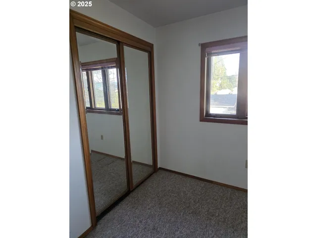 a view of front door with a bathroom