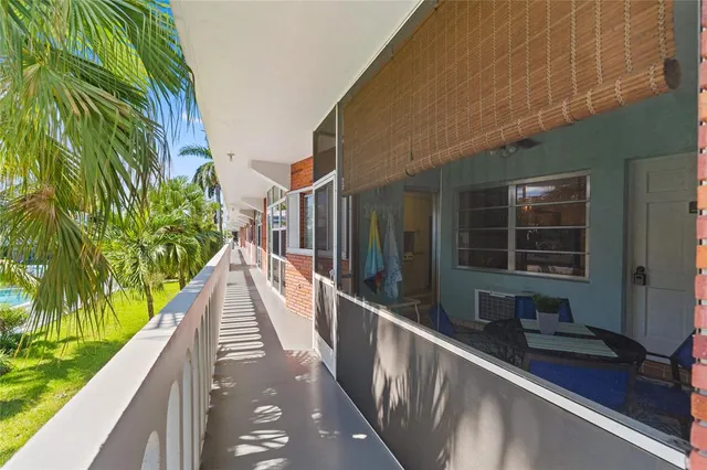 a view of balcony and wooden floor