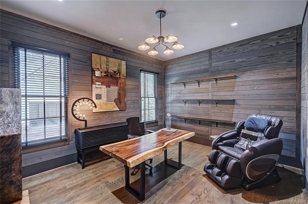 2346 Overhill Road Charlotte, NC 28211 - Photo 13 of 38 a living room with furniture a window and a chandelier