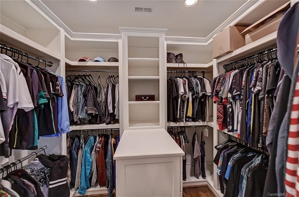 2346 Overhill Road Charlotte, NC 28211 - Photo 20 of 38 a view of walk in closet with clothes and shoes