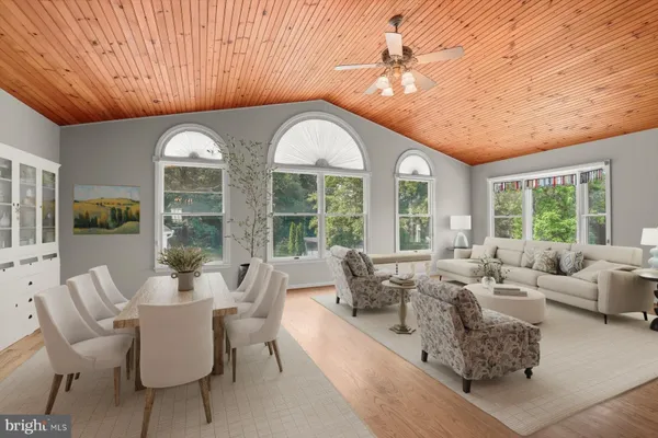 a view of balcony with deck and trees