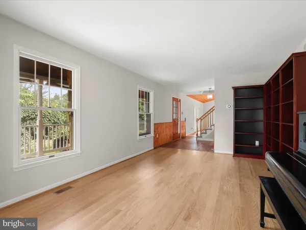 a view of a house with a yard and garage