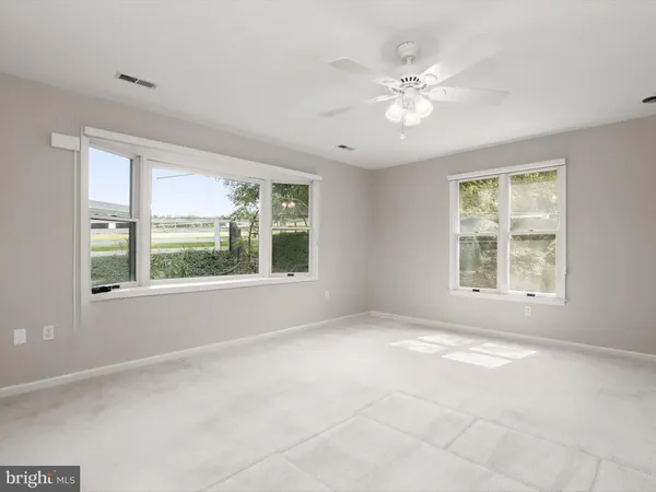 a open kitchen with stainless steel appliances granite countertop a stove and cabinets