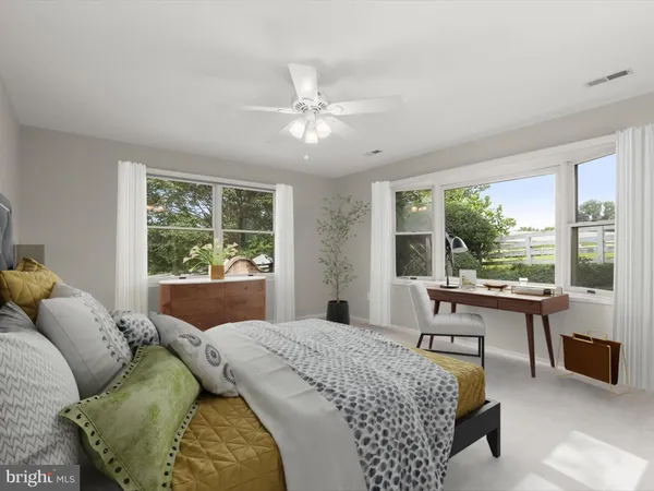 a kitchen with stainless steel appliances a stove a sink and cabinets