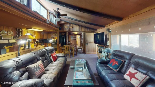 a view of an entryway with wooden floor and stairs