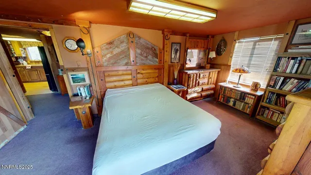 a view of a hallway with furniture