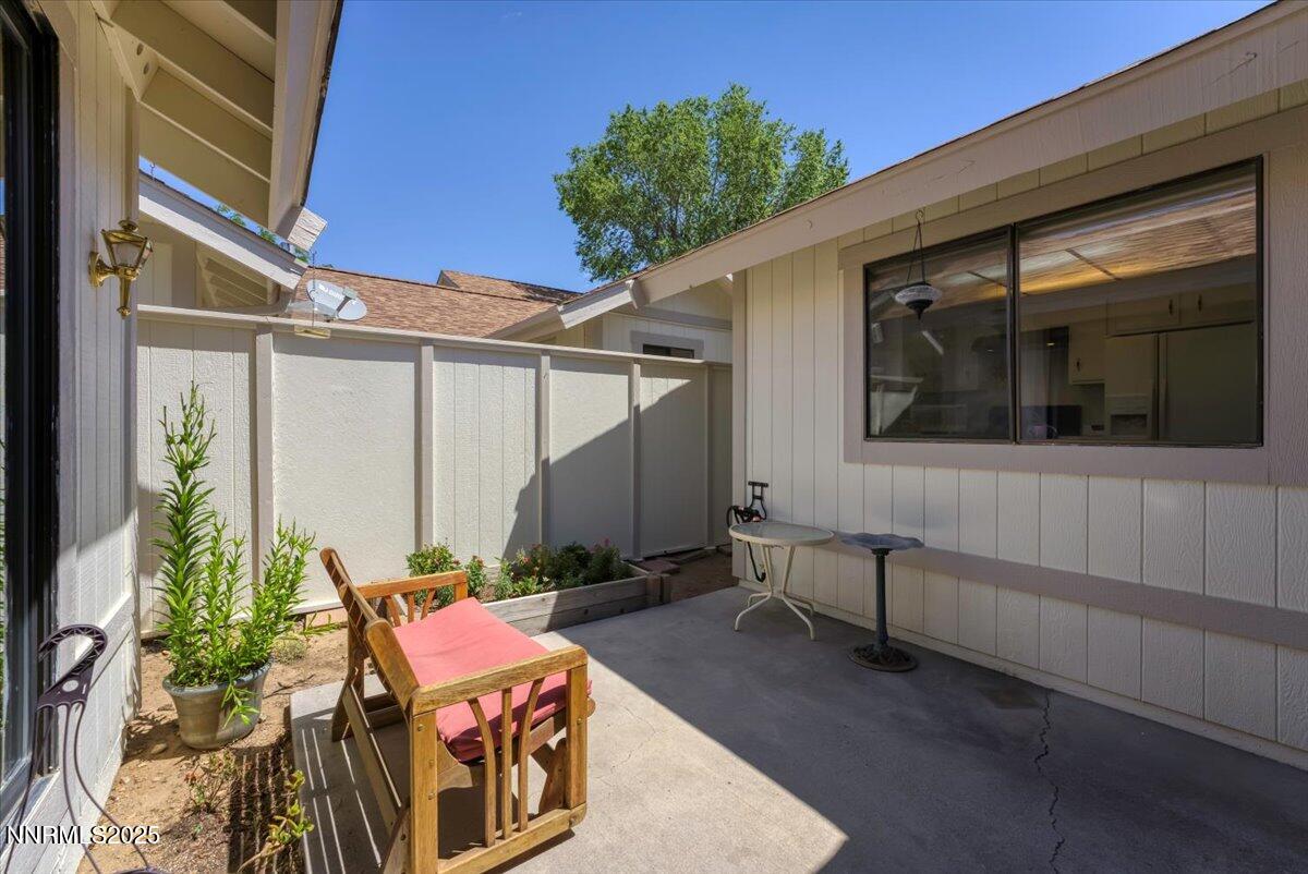 1161 Rayburn Drive Reno, NV 89503 - Photo 27 of 37 a backyard of a house with outdoor seating