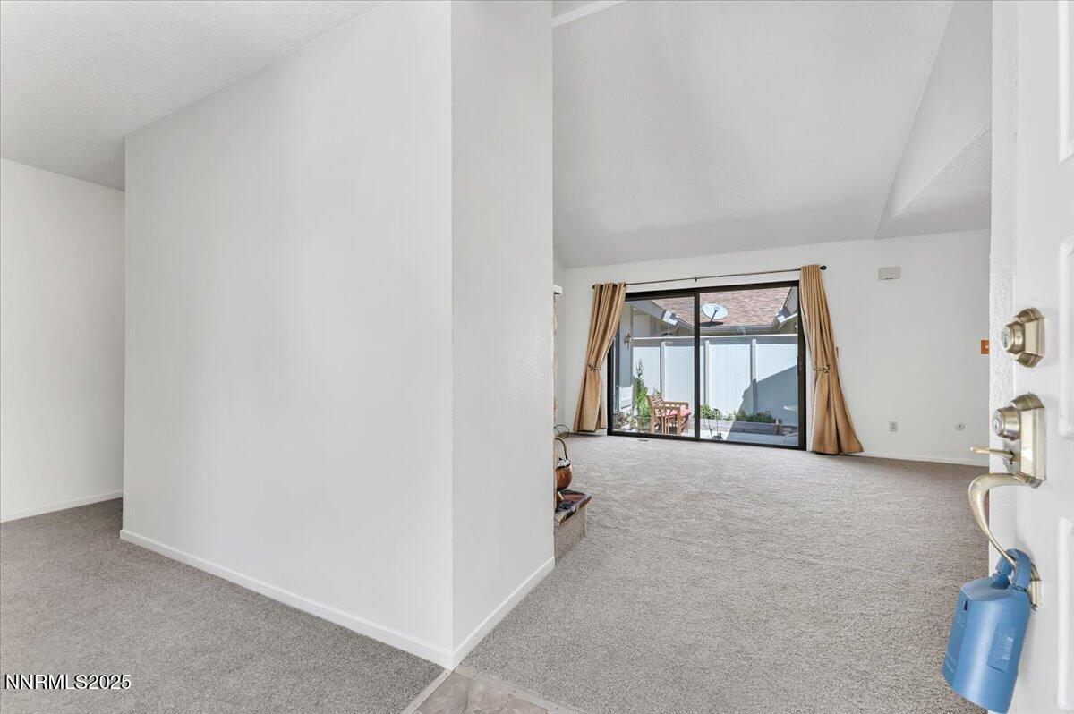 1161 Rayburn Drive Reno, NV 89503 - Photo 6 of 37 an empty room with windows