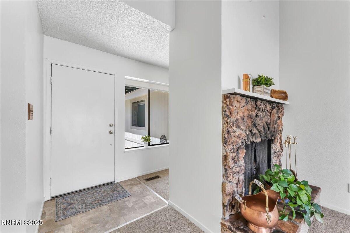 1161 Rayburn Drive Reno, NV 89503 - Photo 7 of 37 wooden floor in a gallery with a mirror