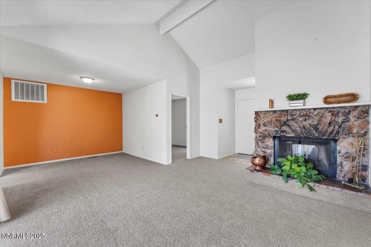 1161 Rayburn Drive Reno, NV 89503 - Photo 9 of 37 a view of an empty room with a fireplace