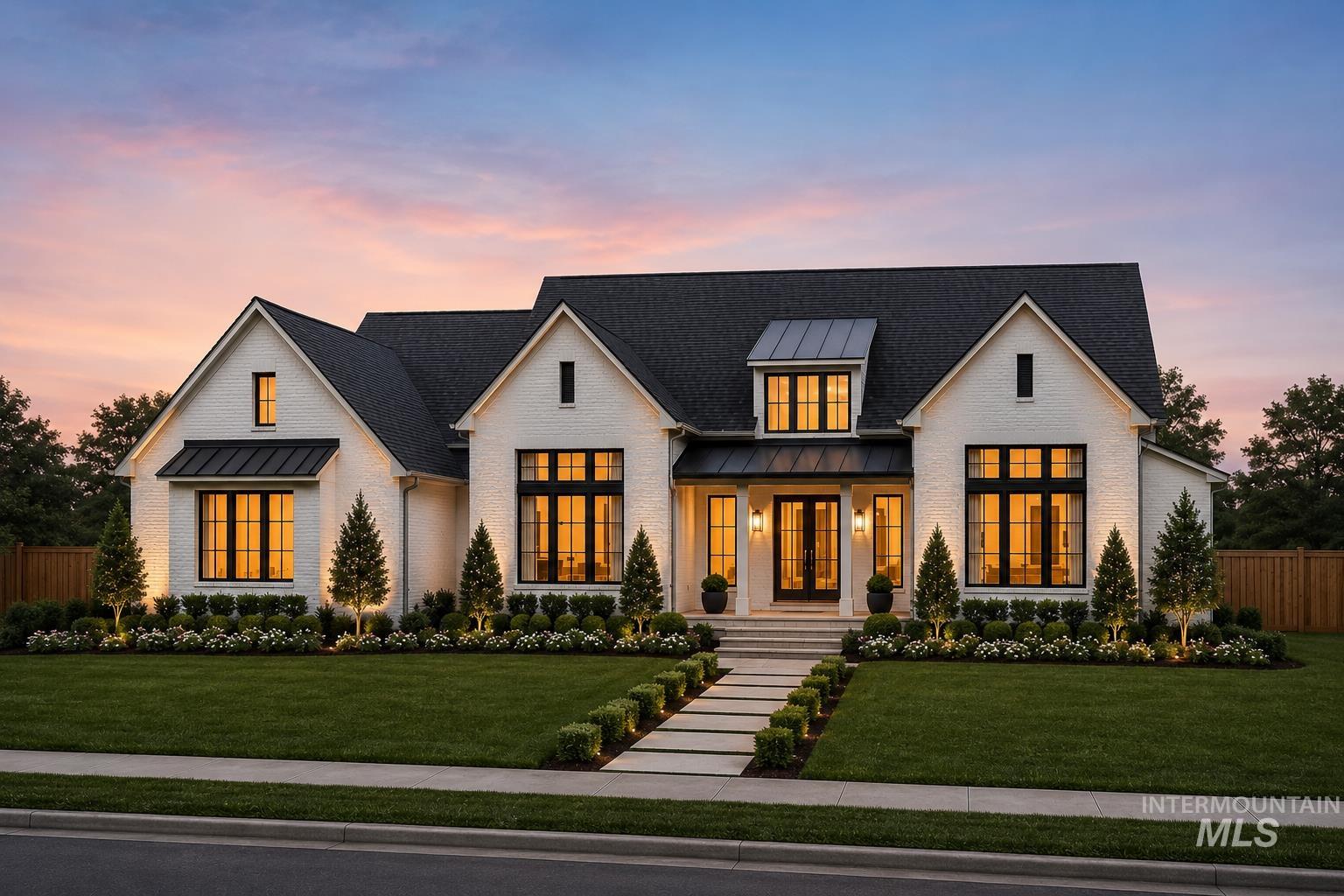 Tbd Lot 2 Tbd Boise, ID 83713 - Photo 1 of 5 White brick exterior with dark shingle roofing, featuring a prominent front entrance with double glass-panel doors
