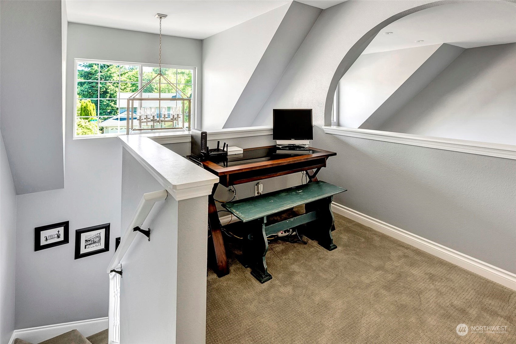 23306 22nd Drive Southeast Bothell, WA 98021 - Photo 18 of 32 a view of a workspace with furniture and a window