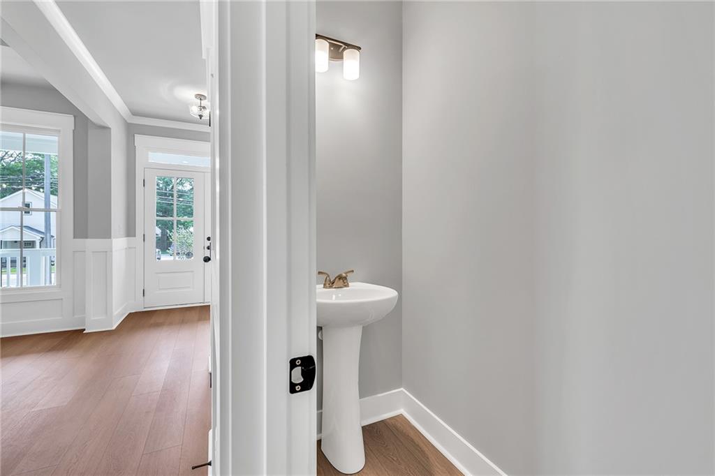 229 East Marable Street Monroe, GA 30655 - Photo 13 of 39 wooden floor in a gallery