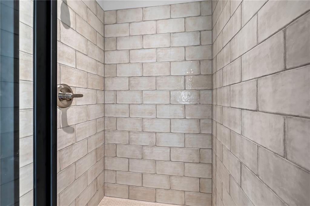 229 East Marable Street Monroe, GA 30655 - Photo 19 of 39 a bathroom with a shower