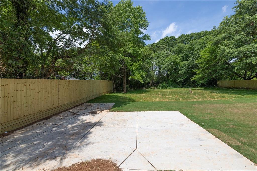 229 East Marable Street Monroe, GA 30655 - Photo 29 of 39 a view of a backyard