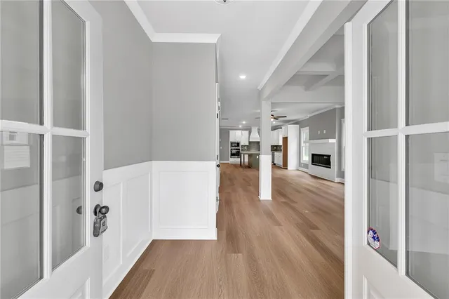 a view of a living room and a refrigerator