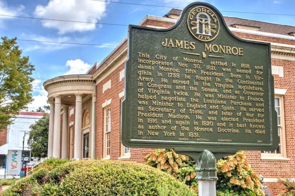 229 East Marable Street Monroe, GA 30655 - Photo 33 of 39 a sign that is on a wall