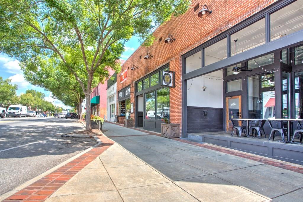 229 East Marable Street Monroe, GA 30655 - Photo 36 of 39 a view of a building with a street