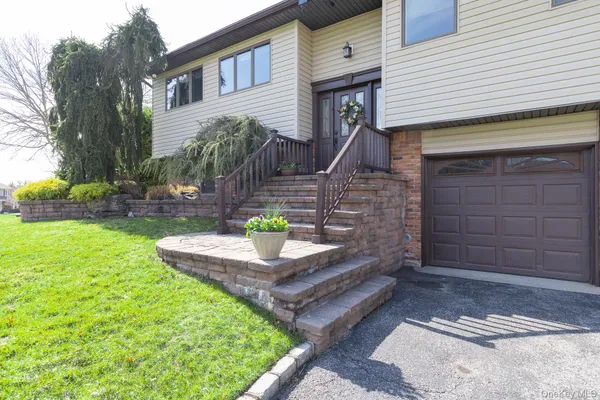 a front view of house with outdoor space