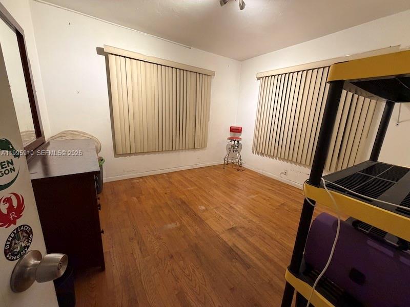 446 Northwest 45th Street Miami, FL 33127 - Photo 11 of 15 a view of an empty room with a window