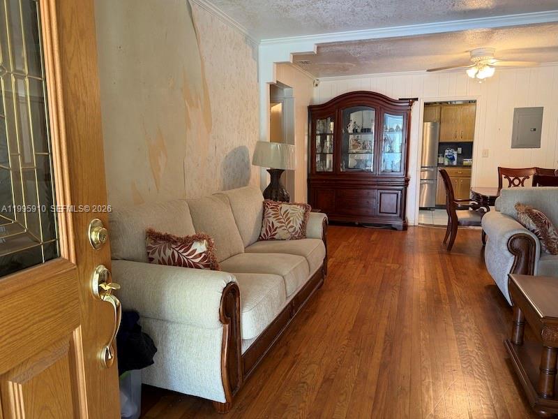 446 Northwest 45th Street Miami, FL 33127 - Photo 5 of 15 a living room with furniture and a fireplace