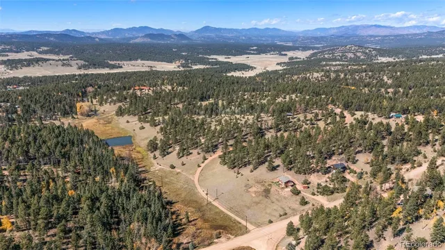 a view of lake with mountain
