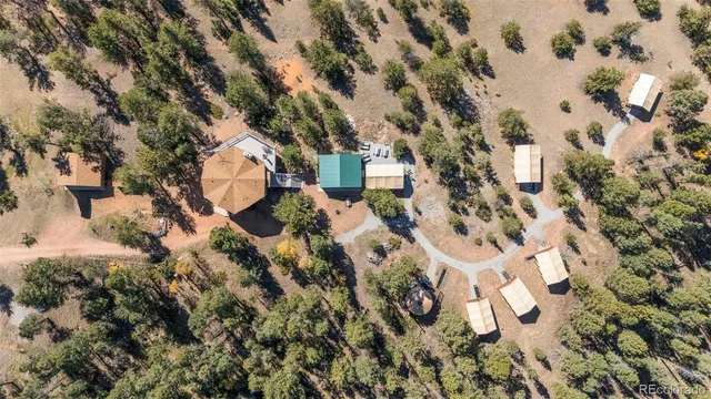 an aerial view of residential house with parking space