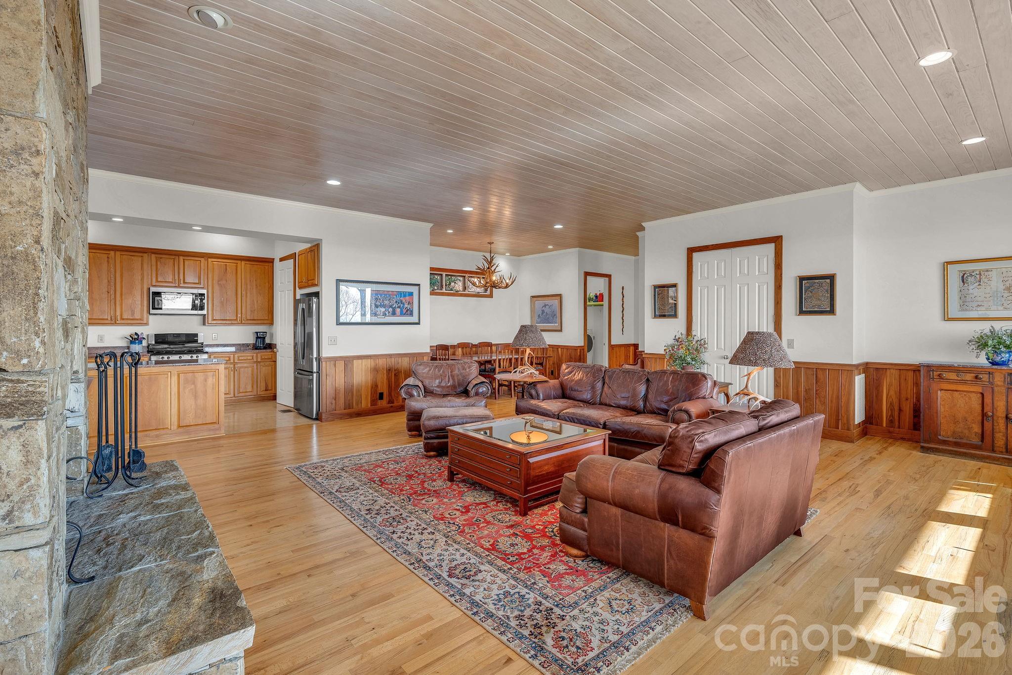 933 Thunder Ridge Lane, Unit 4 & 2 Lenoir, NC 28645 - Photo 11 of 45 a living room with furniture wooden floor and kitchen view
