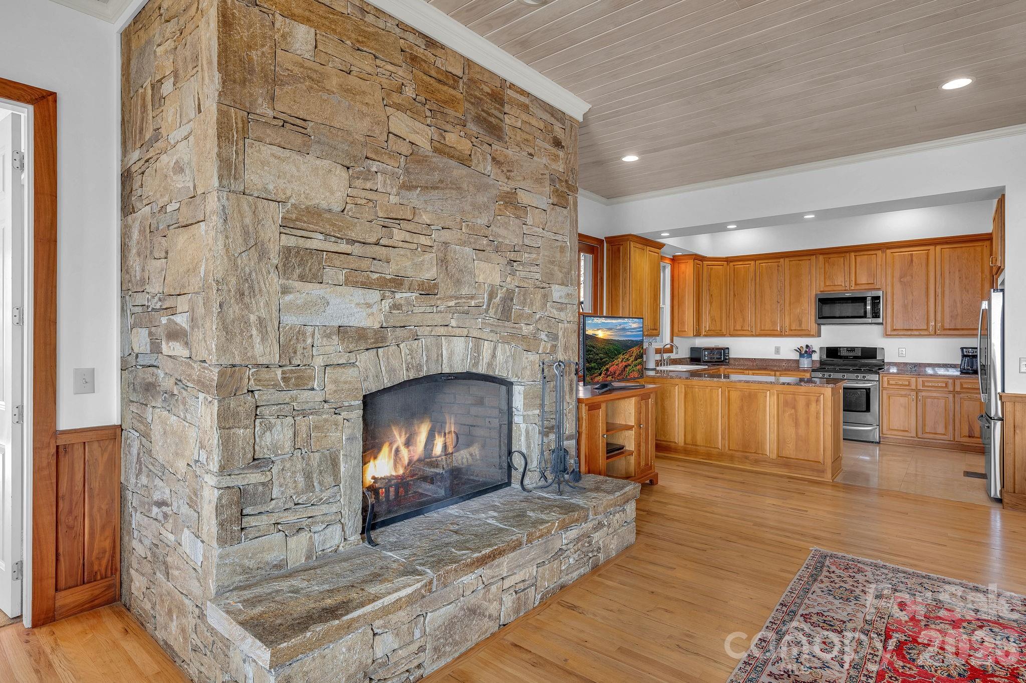 933 Thunder Ridge Lane, Unit 4 & 2 Lenoir, NC 28645 - Photo 12 of 45 a living room with furniture and a fireplace
