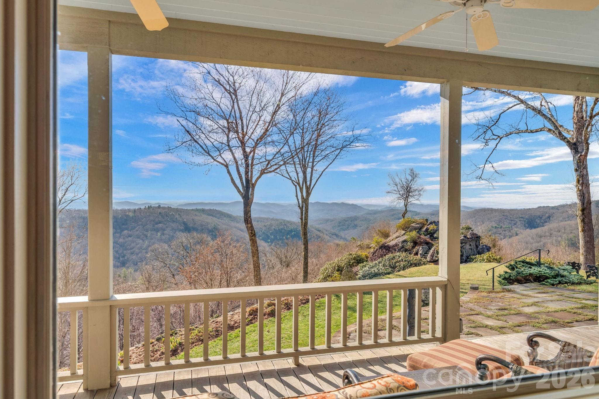 933 Thunder Ridge Lane, Unit 4 & 2 Lenoir, NC 28645 - Photo 17 of 45 a view of a balcony with floor to ceiling windows with wooden floor