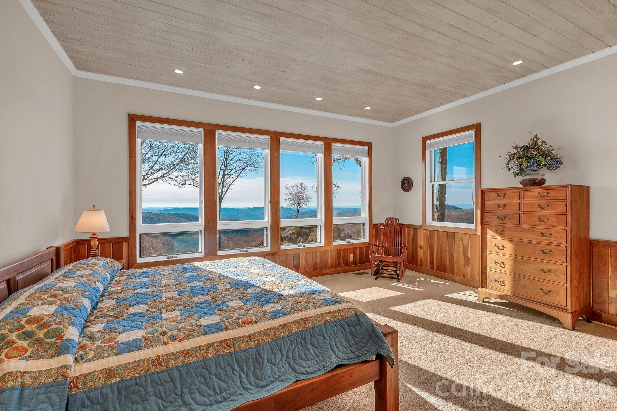 933 Thunder Ridge Lane, Unit 4 & 2 Lenoir, NC 28645 - Photo 19 of 45 a bedroom with a large bed and a large window