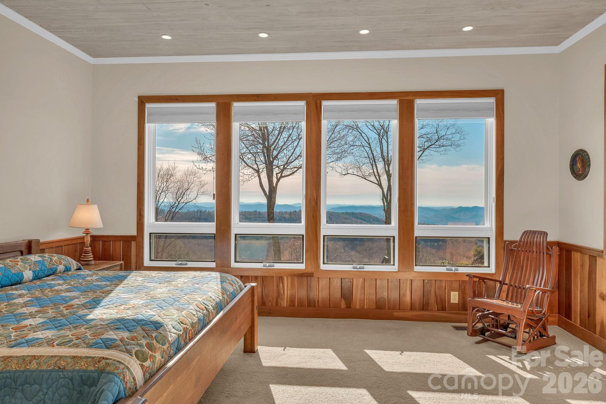 933 Thunder Ridge Lane, Unit 4 & 2 Lenoir, NC 28645 - Photo 21 of 45 a bedroom with a large bed and a large window