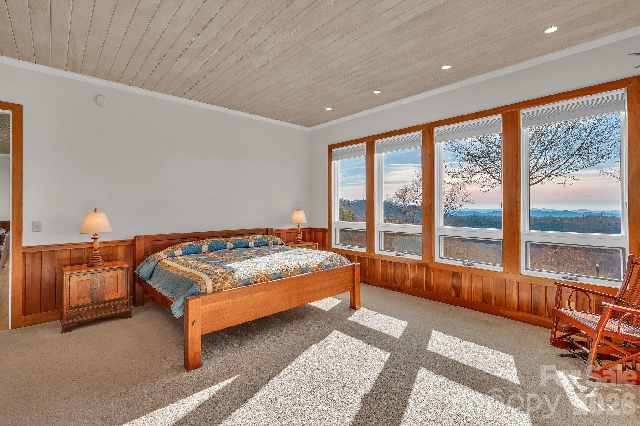 933 Thunder Ridge Lane, Unit 4 & 2 Lenoir, NC 28645 - Photo 22 of 45 a bedroom with a bed and a large window