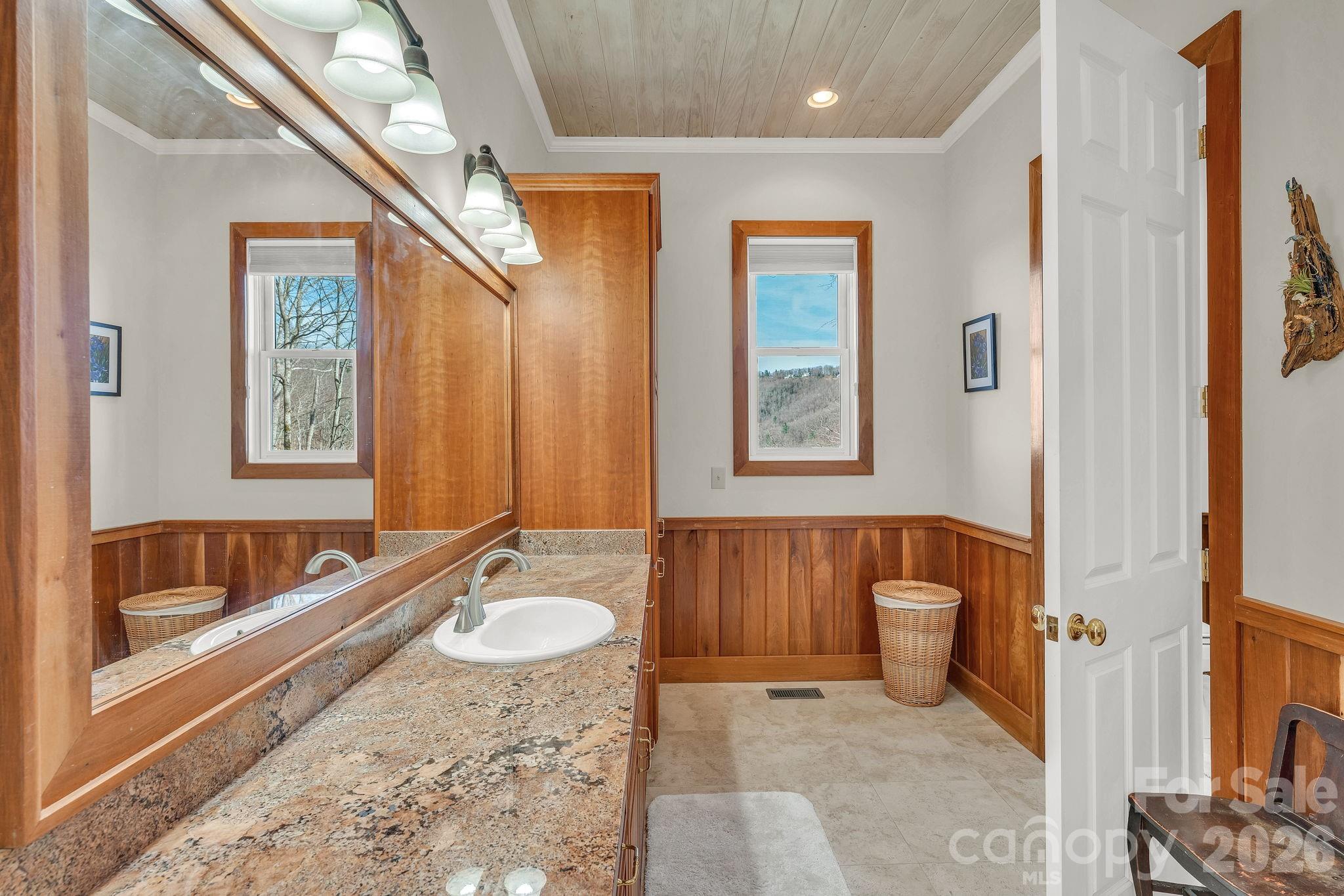933 Thunder Ridge Lane, Unit 4 & 2 Lenoir, NC 28645 - Photo 25 of 45 a spacious bathroom with a tub sink and mirror