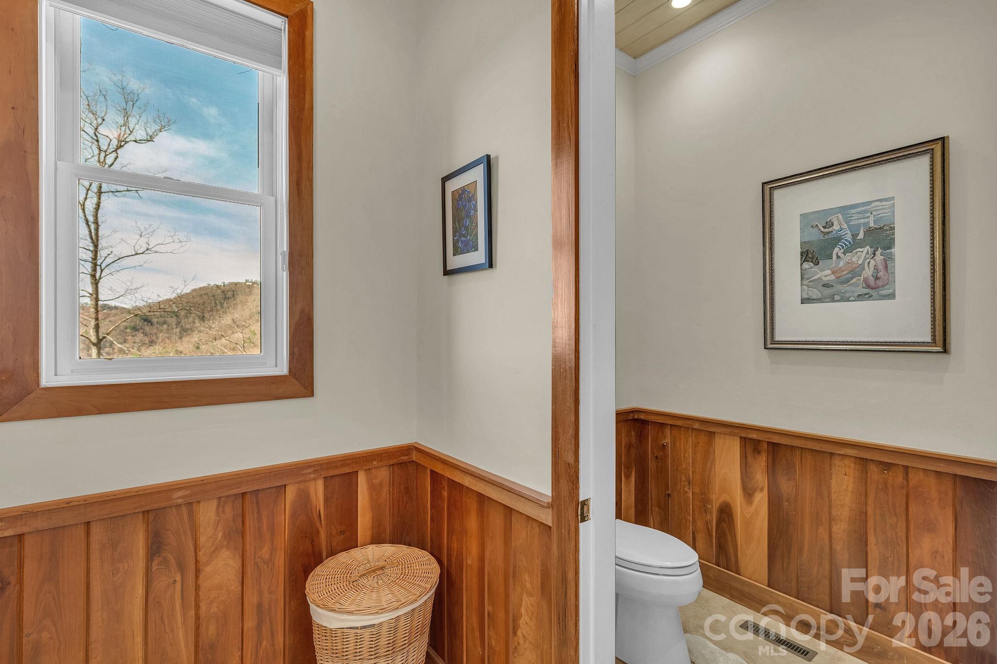 933 Thunder Ridge Lane, Unit 4 & 2 Lenoir, NC 28645 - Photo 26 of 45 a bathroom with a toilet a sink and a mirror