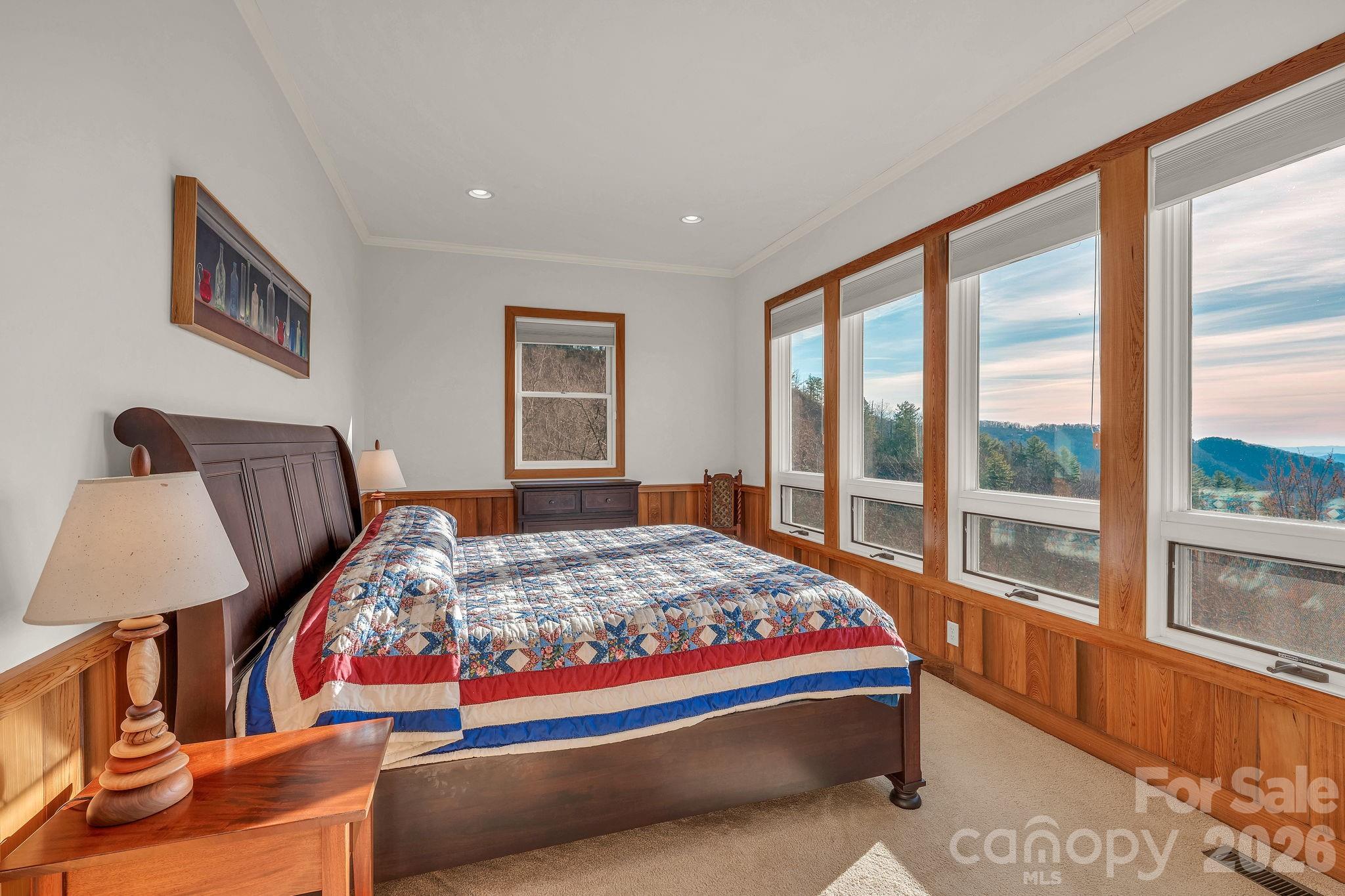 933 Thunder Ridge Lane, Unit 4 & 2 Lenoir, NC 28645 - Photo 28 of 45 a bedroom with bed and a large window