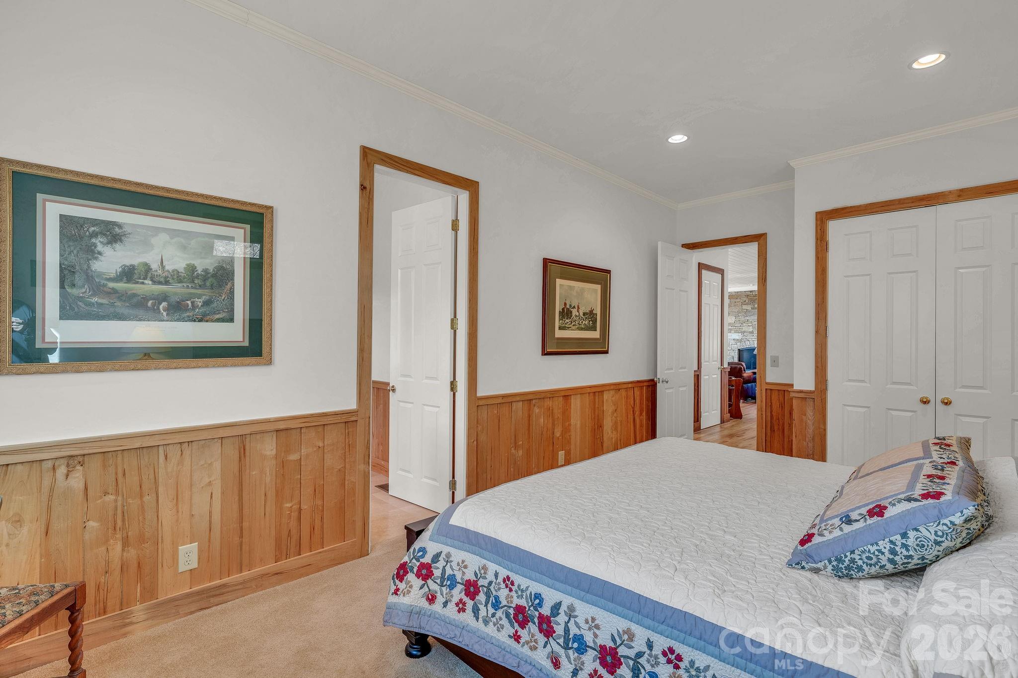 933 Thunder Ridge Lane, Unit 4 & 2 Lenoir, NC 28645 - Photo 35 of 45 a bedroom with a large bed and a dresser