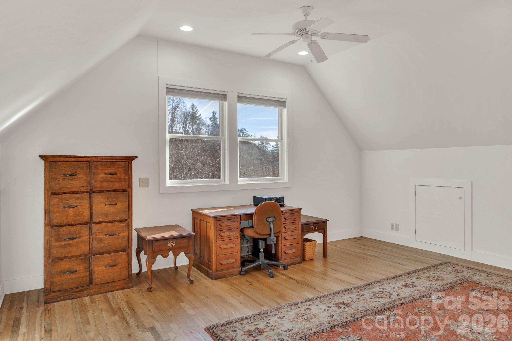 933 Thunder Ridge Lane, Unit 4 & 2 Lenoir, NC 28645 - Photo 39 of 45 a living room with furniture and a window