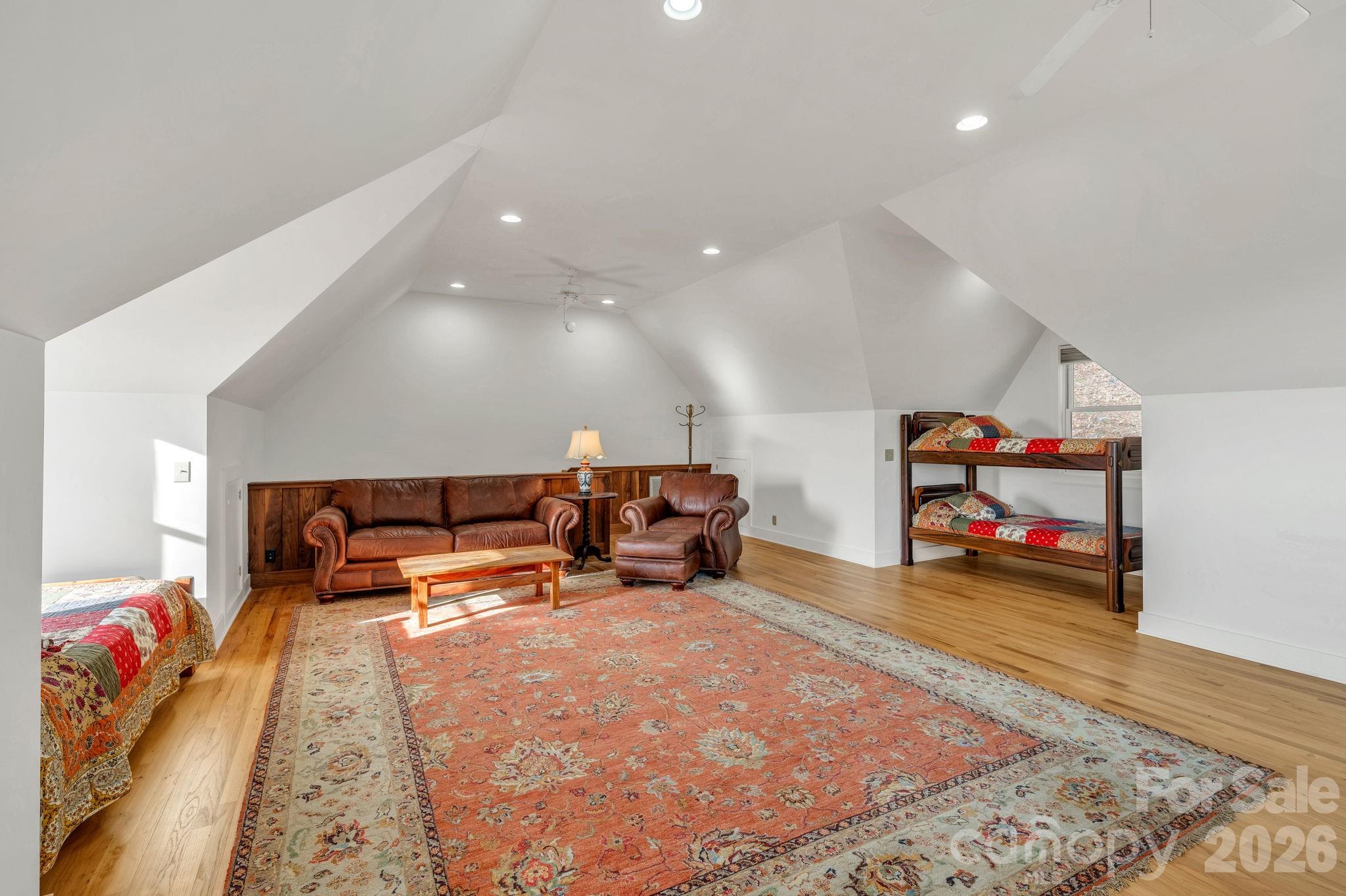 933 Thunder Ridge Lane, Unit 4 & 2 Lenoir, NC 28645 - Photo 40 of 45 a bed room with furniture and a gym